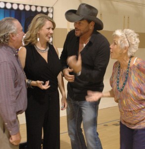 Steve Petro, left, and Kelly Petro, right, talk with Andrea and Darryl Gatlin. (Photo by Deb Patterson & courtesy of  Ink Free News)